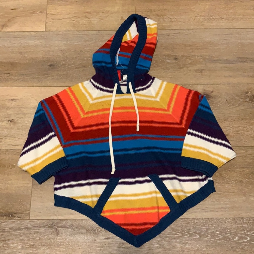 Rainbow poncho, cropped, size 4/small. Bought in France. Divided by H&M.